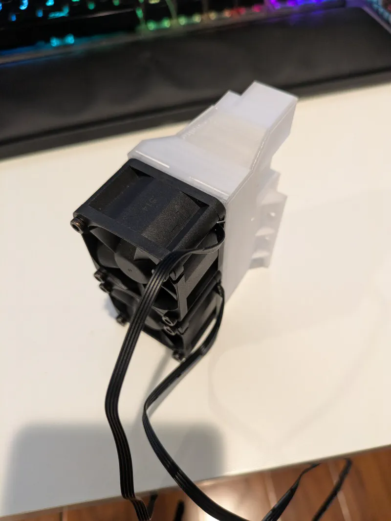 3D-printed cooling shroud on a Tesla P40