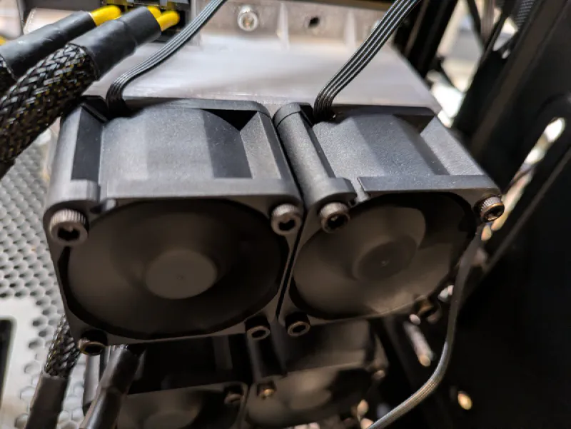 Both Tesla P40s with cooling shrouds installed